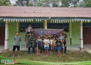 Satgas Pamtas Yonkav 12/BC Memperkuat Tali Silaturahmi Bersama Masyarakat Lewat Kegiatan Karya Bhakti