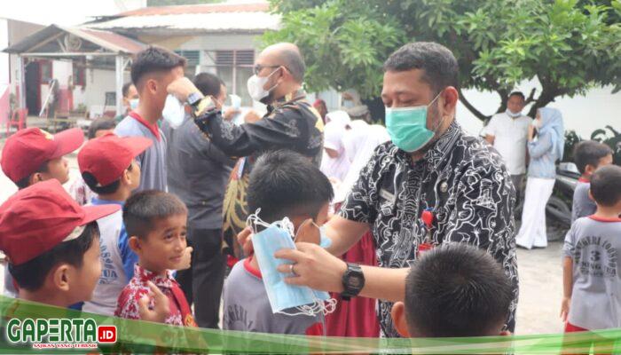 Cegah Penularan Influenza di Sekolah, Dinas Kesehatan PALUTA dan BPBD Bagikan Masker Secara Gratis